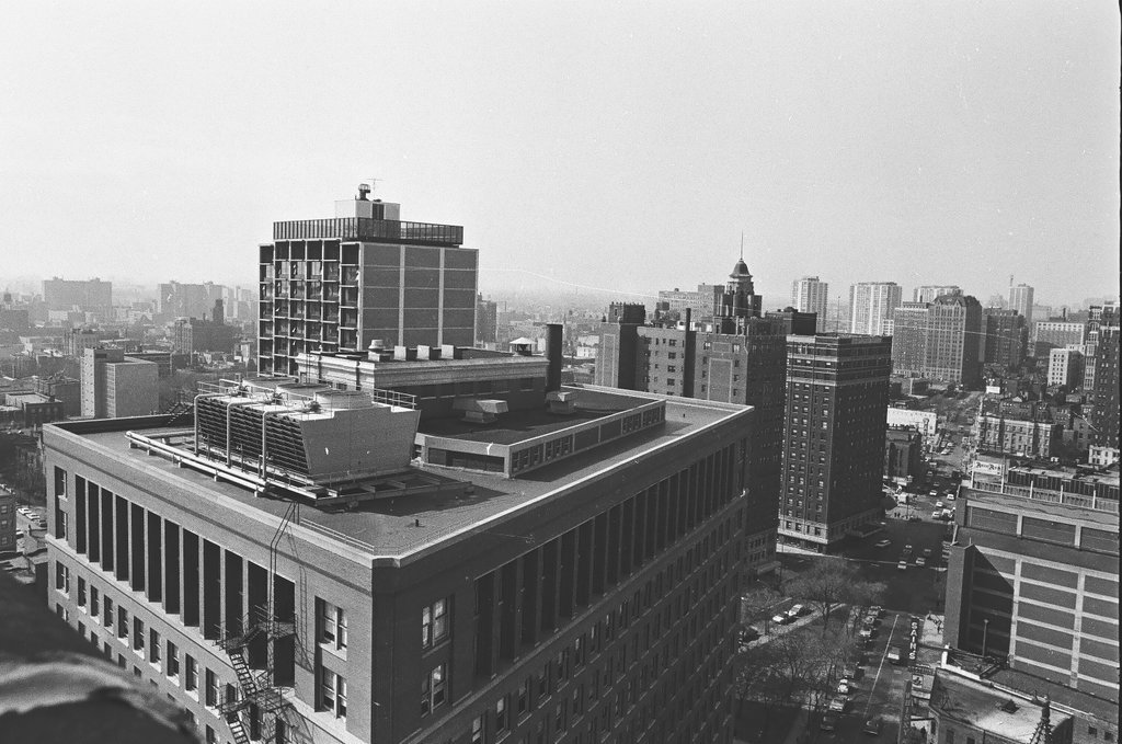 Aerial view of water tower and skyscraper construction - Bob Langer for Chicago Sun-Times