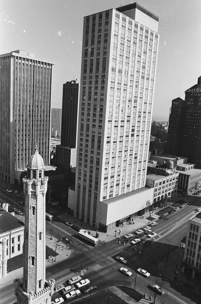 Aerial view of water tower and skyscraper construction - Bob Langer for Chicago Sun-Times