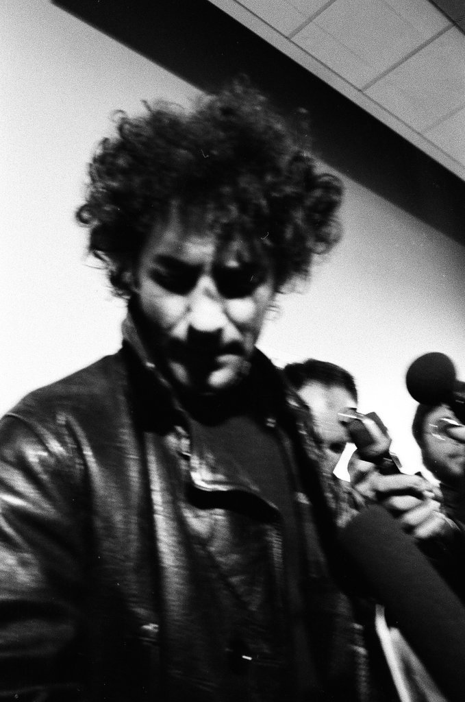 Abbie Hoffman arrives at O'Hare - Larry Graff for Chicago Sun-Times