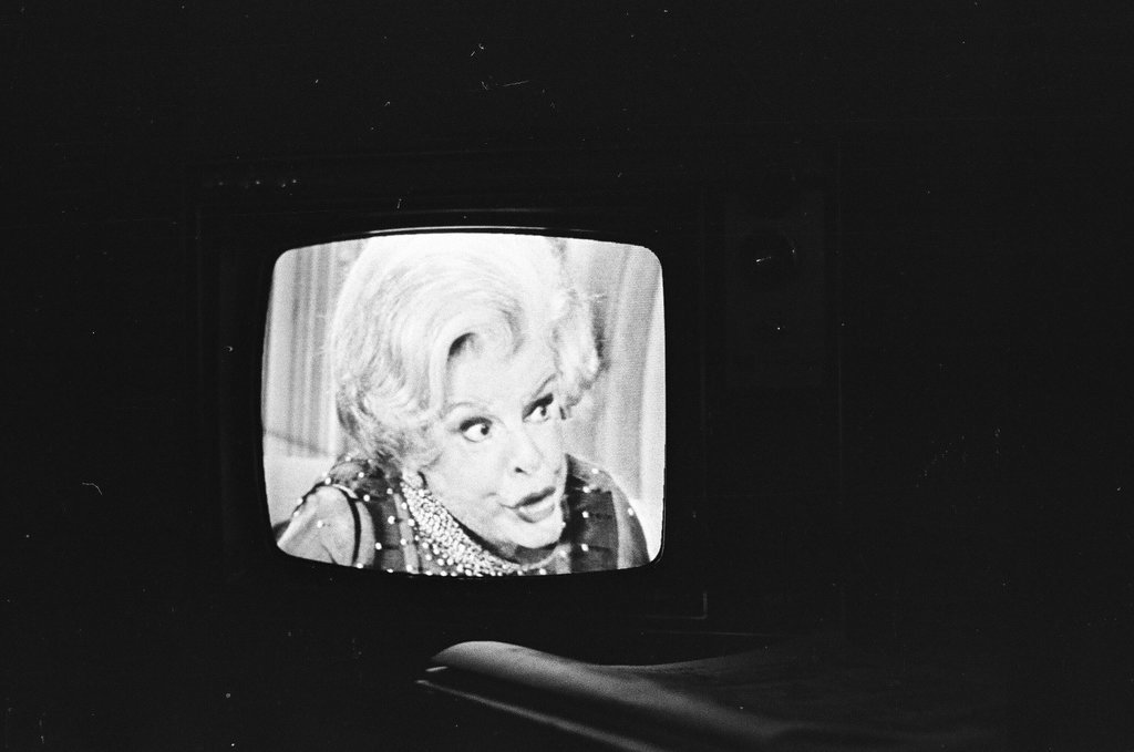 Television set showing Merv Griffin Show - Bob (Robert) Black for Chicago Sun-Times