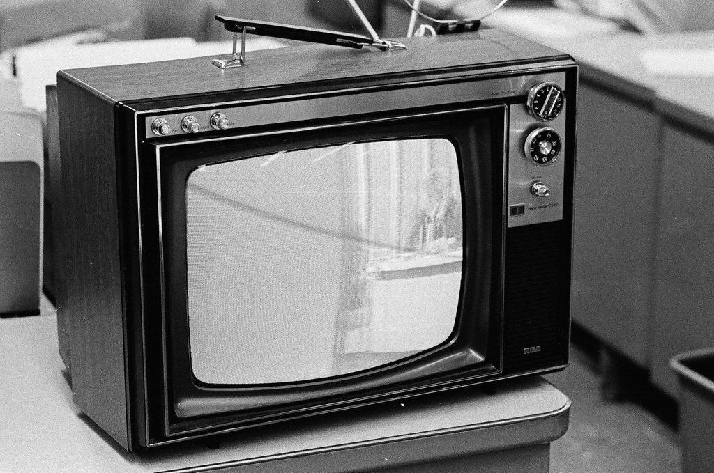 Television set showing Merv Griffin Show - Bob (Robert) Black for Chicago Sun-Times