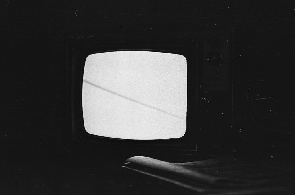 Television set showing Merv Griffin Show - Bob (Robert) Black for Chicago Sun-Times