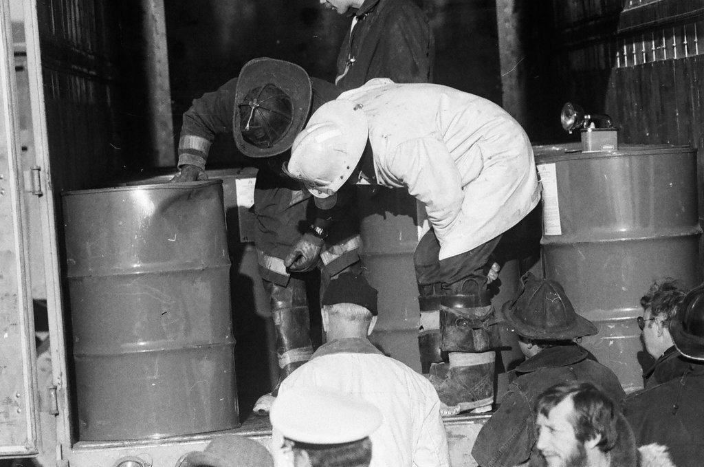 Firefighters remove leaking drums from trailer - Jack Lenahan for Chicago Sun-Times