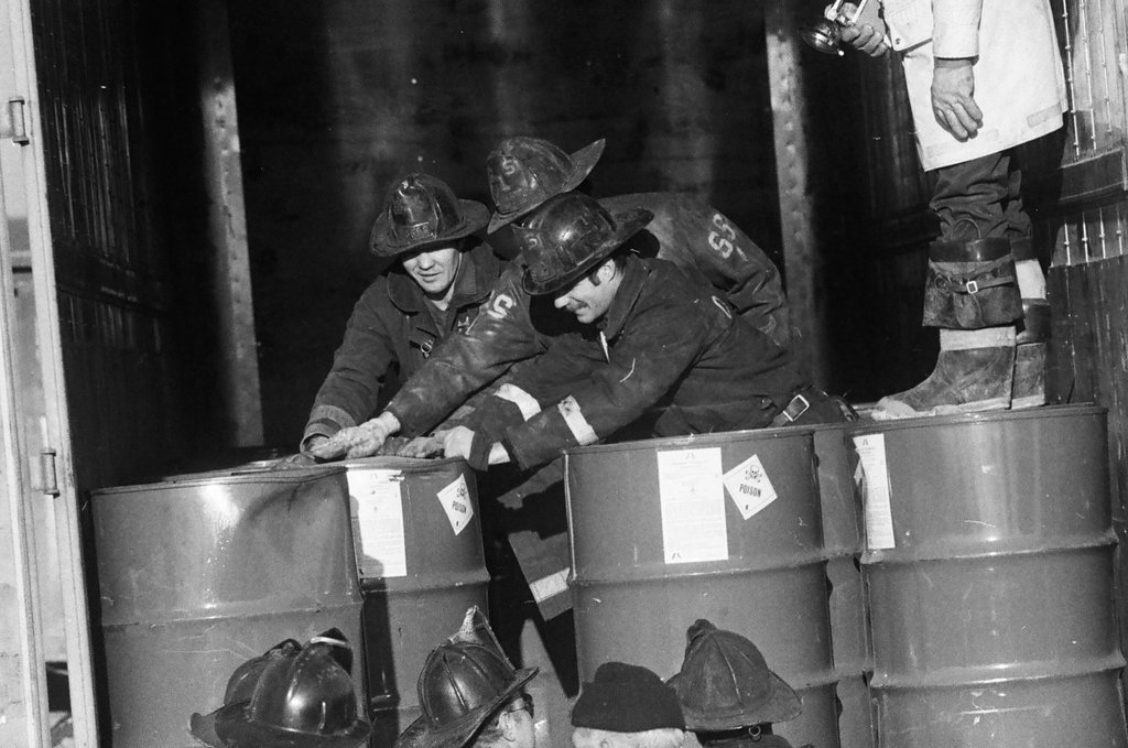 Firefighters remove leaking drums from trailer - Jack Lenahan for Chicago Sun-Times