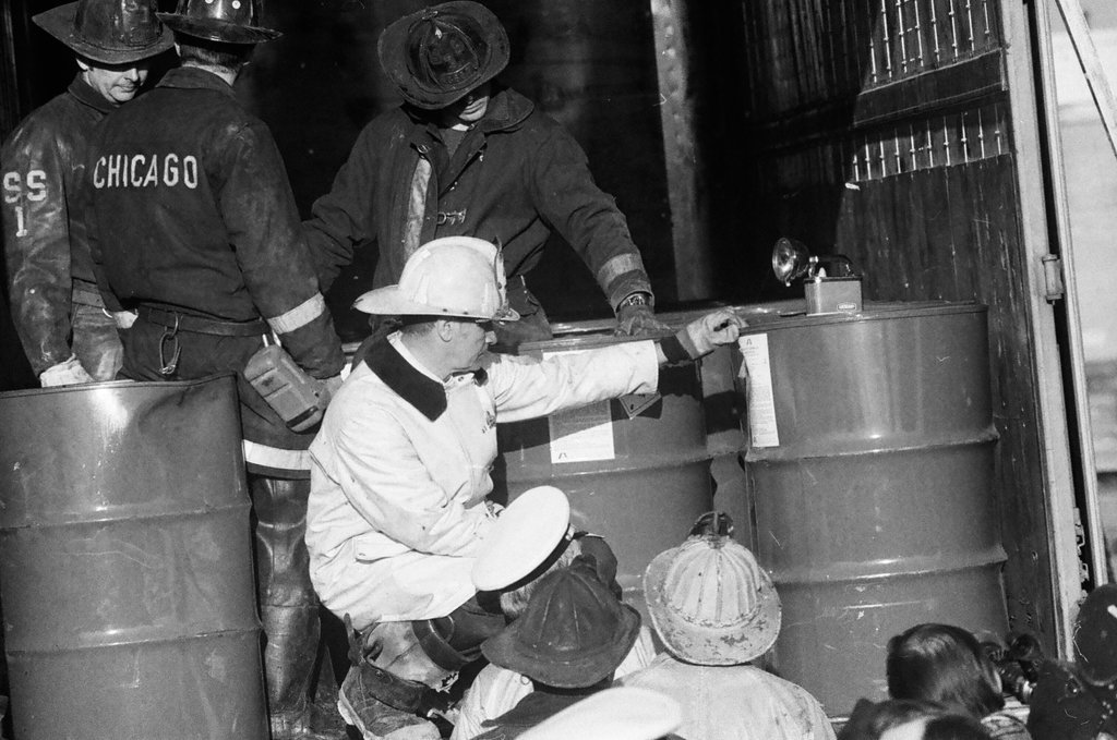 Firefighters remove leaking drums from trailer - Jack Lenahan for Chicago Sun-Times
