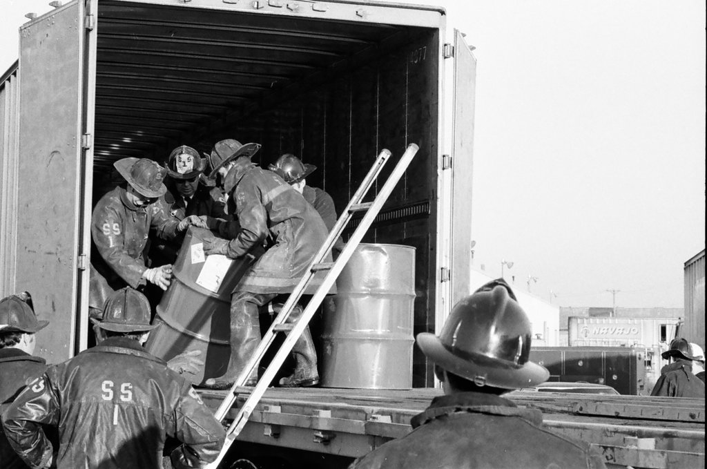 Firefighters remove leaking drums from trailer - Jack Lenahan for Chicago Sun-Times