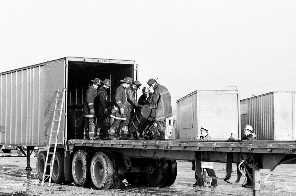 Firefighters remove leaking drums from trailer - Jack Lenahan for Chicago Sun-Times
