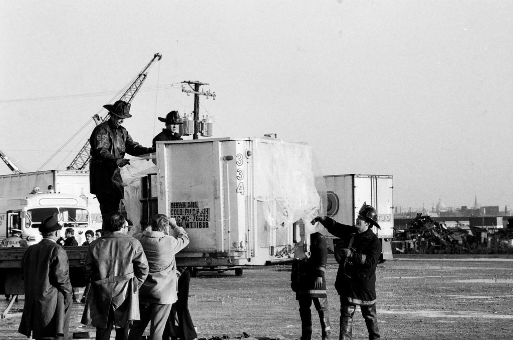 Firefighters remove leaking drums from trailer - Jack Lenahan for Chicago Sun-Times