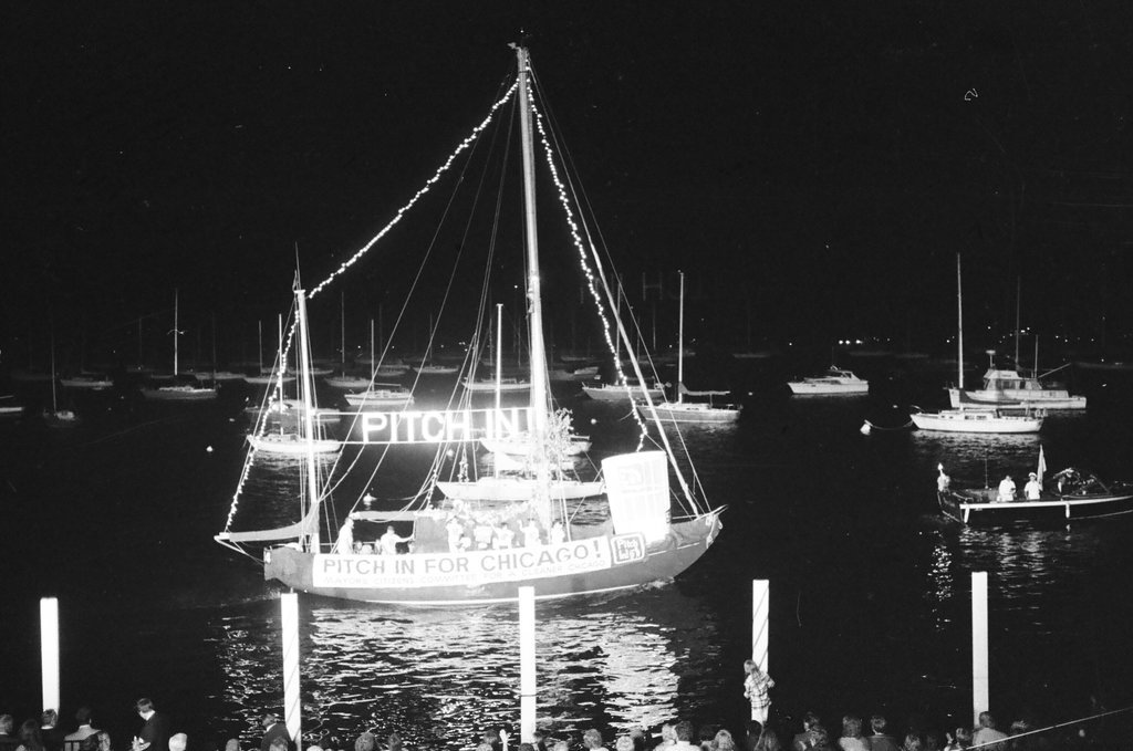 The Venetian Night parade is underway at Monroe Harbor - Chuck (Charles) Kirman for Chicago Sun-Times