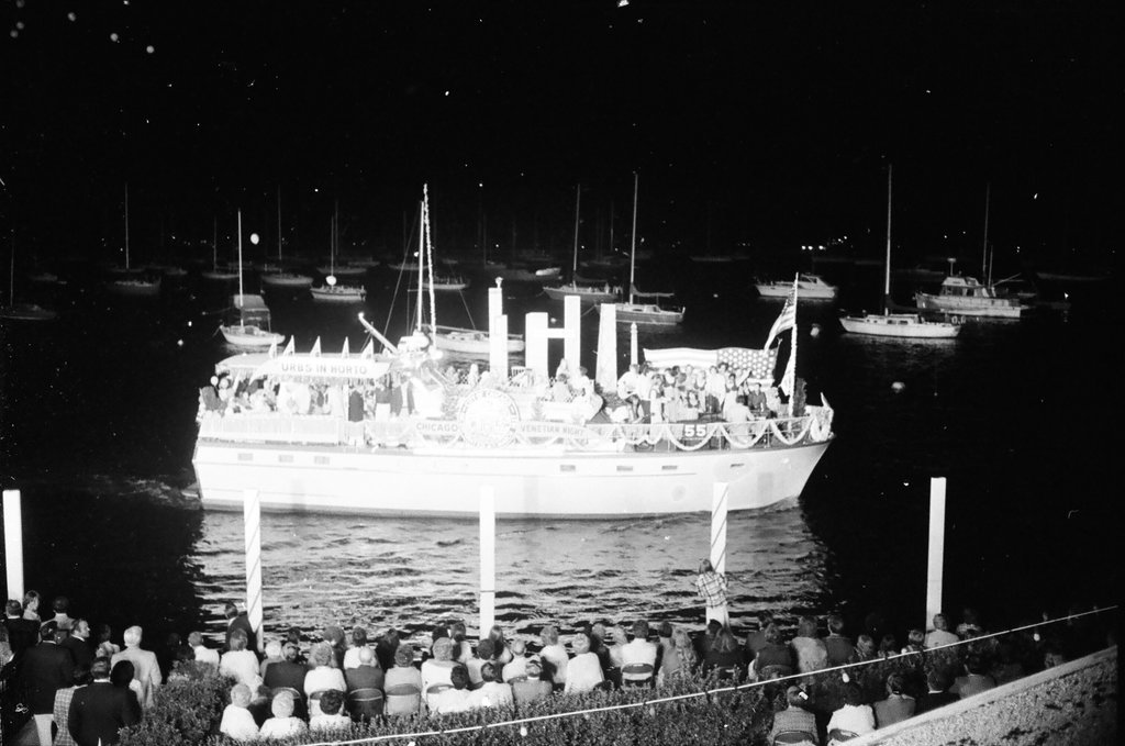 The Venetian Night parade is underway at Monroe Harbor - Chuck (Charles) Kirman for Chicago Sun-Times