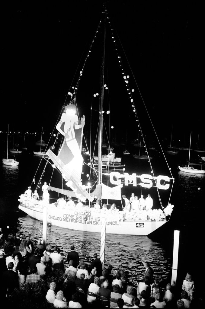 The Venetian Night parade is underway at Monroe Harbor - Chuck (Charles) Kirman for Chicago Sun-Times