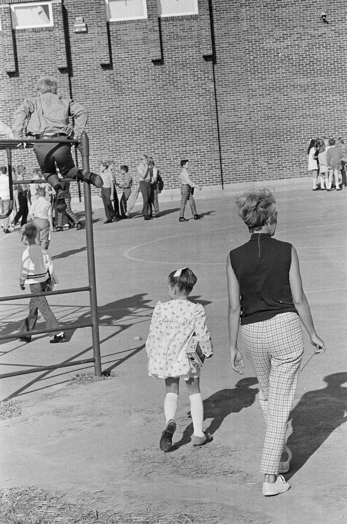 A little girl arrives at Longfellow Elementary School for her first day - Larry Graff for Chicago Sun-Times