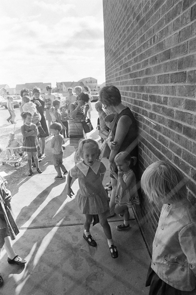 A little girl arrives at Longfellow Elementary School for her first day - Larry Graff for Chicago Sun-Times