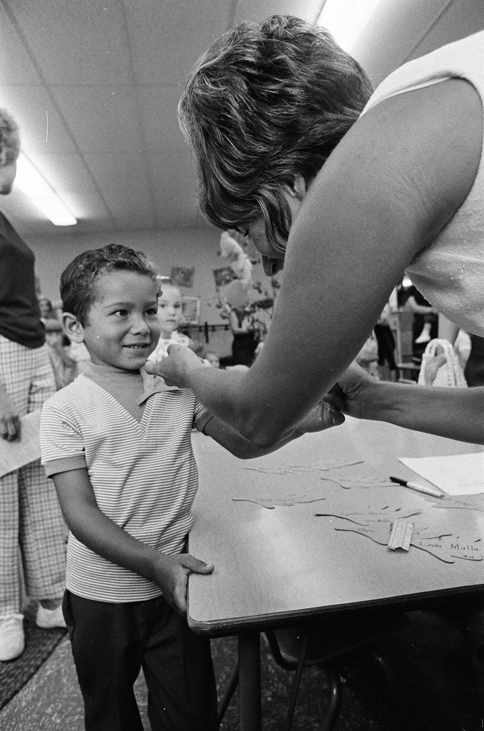 A little girl arrives at Longfellow Elementary School for her first day - Larry Graff for Chicago Sun-Times