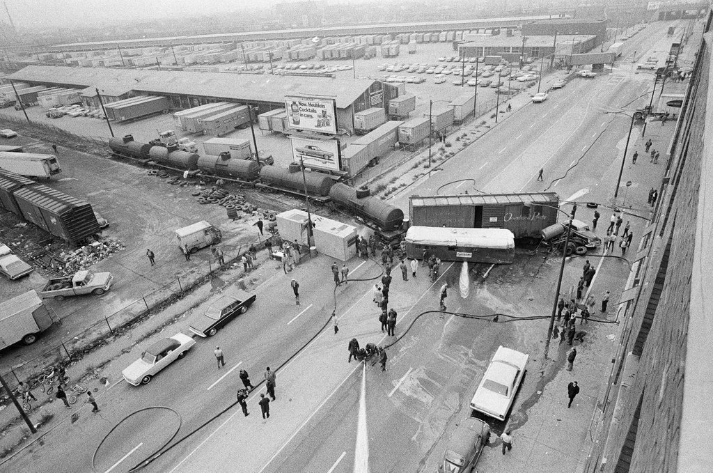 Derailed train stopped in the street - Chicago Sun-Times