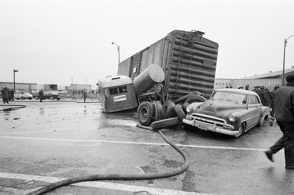 Derailed train stopped in the street - Chicago Sun-Times
