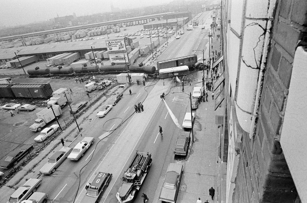 Derailed train stopped in the street - Chicago Sun-Times