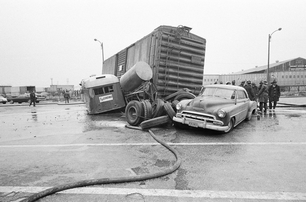 Derailed train stopped in the street - Chicago Sun-Times