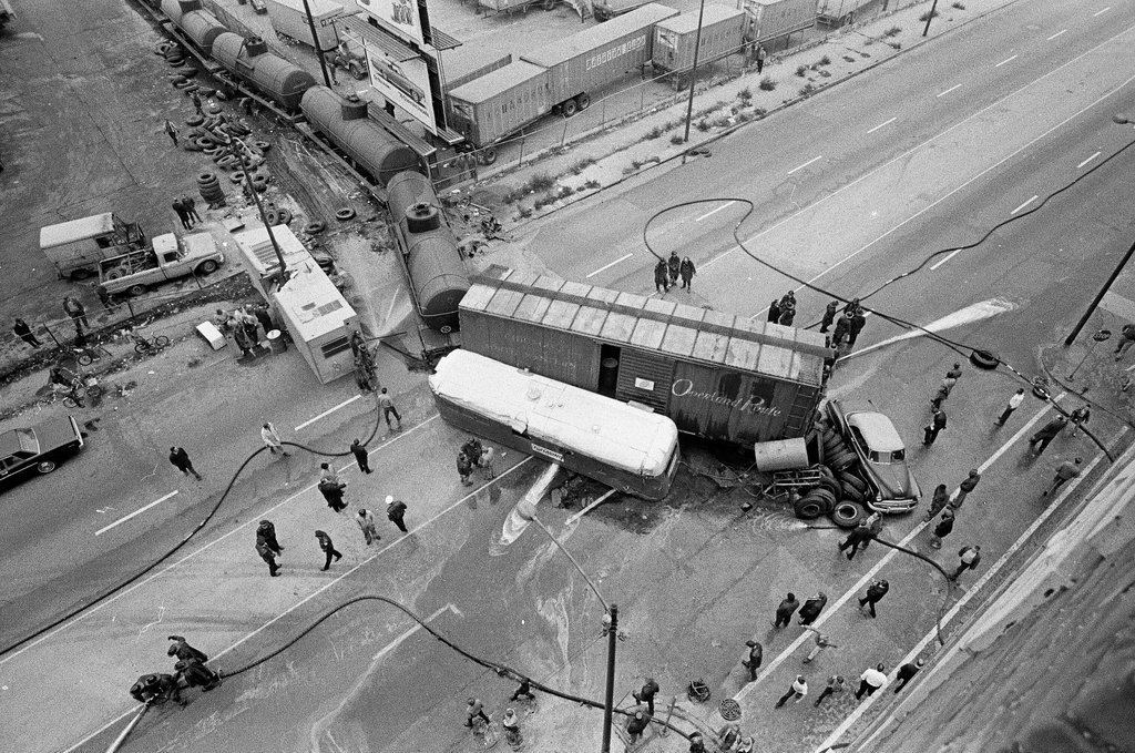 Derailed train stopped in the street - Chicago Sun-Times