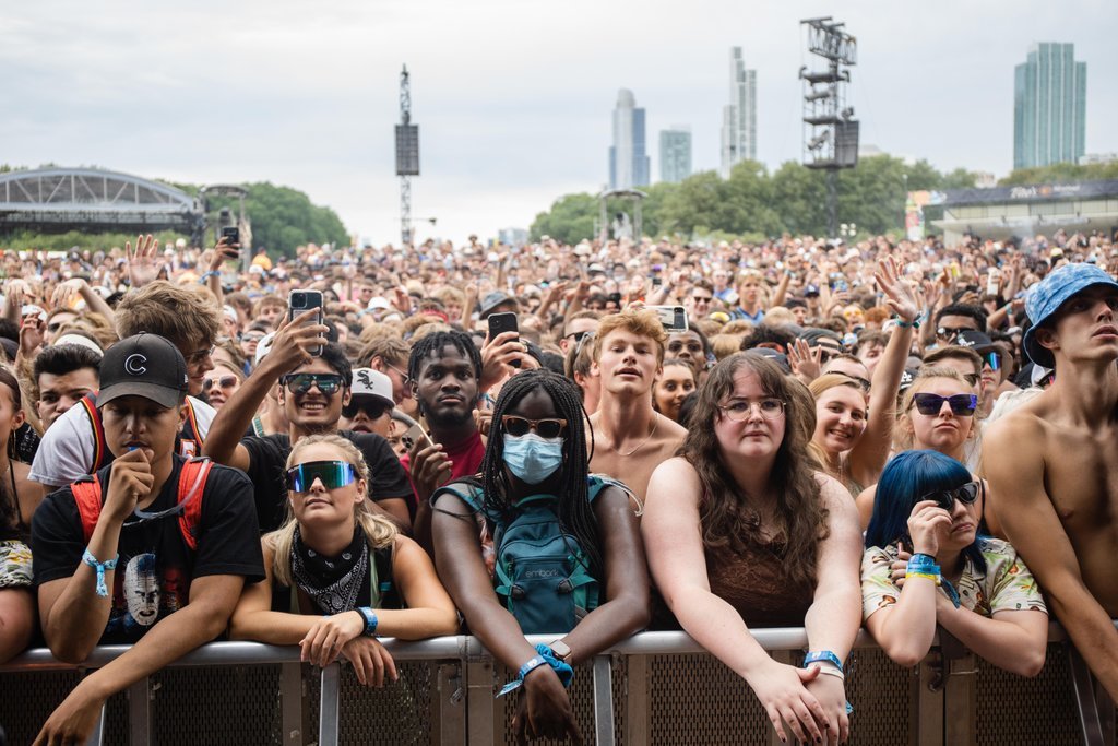 A masked festival goer at Lollapalooza - Pat Nabong for Chicago Sun-Times