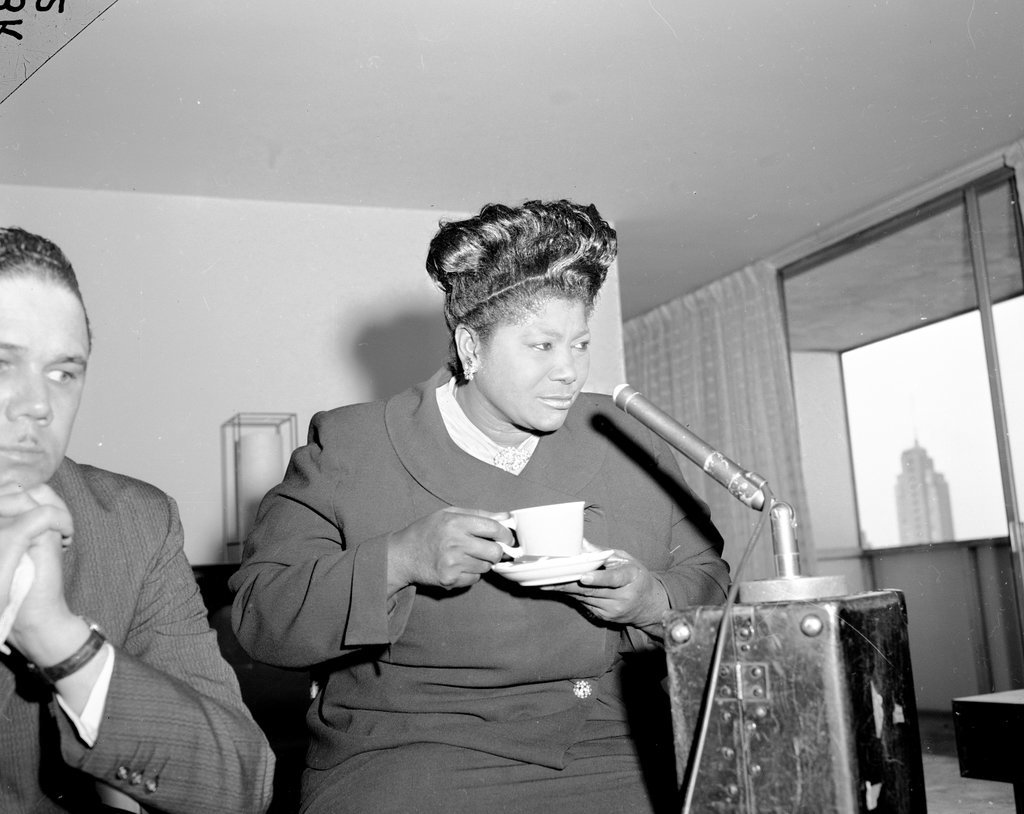 Mahalia Jackson talking to reporters about the National Baptist Convention - Chicago Sun-Times