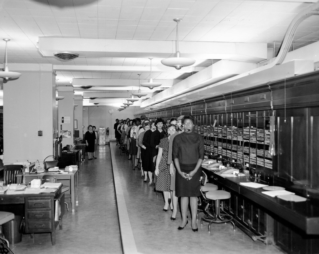 Illinois Bell Telephone Company operators stand during state funeral for President John F. Kennedy - Chicago Sun-Times