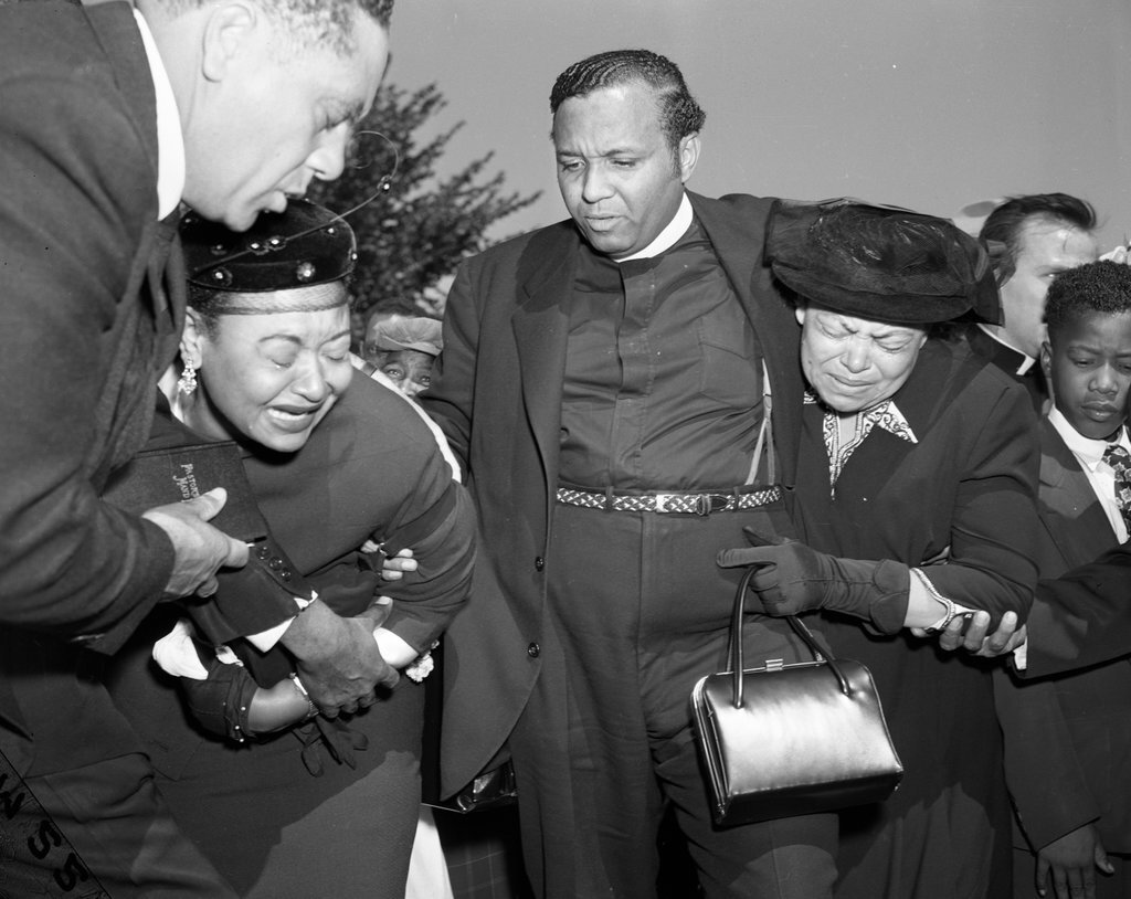 Mamie Bradley, mother of Emmett Till, weeps at his burial service - Chicago Sun-Times
