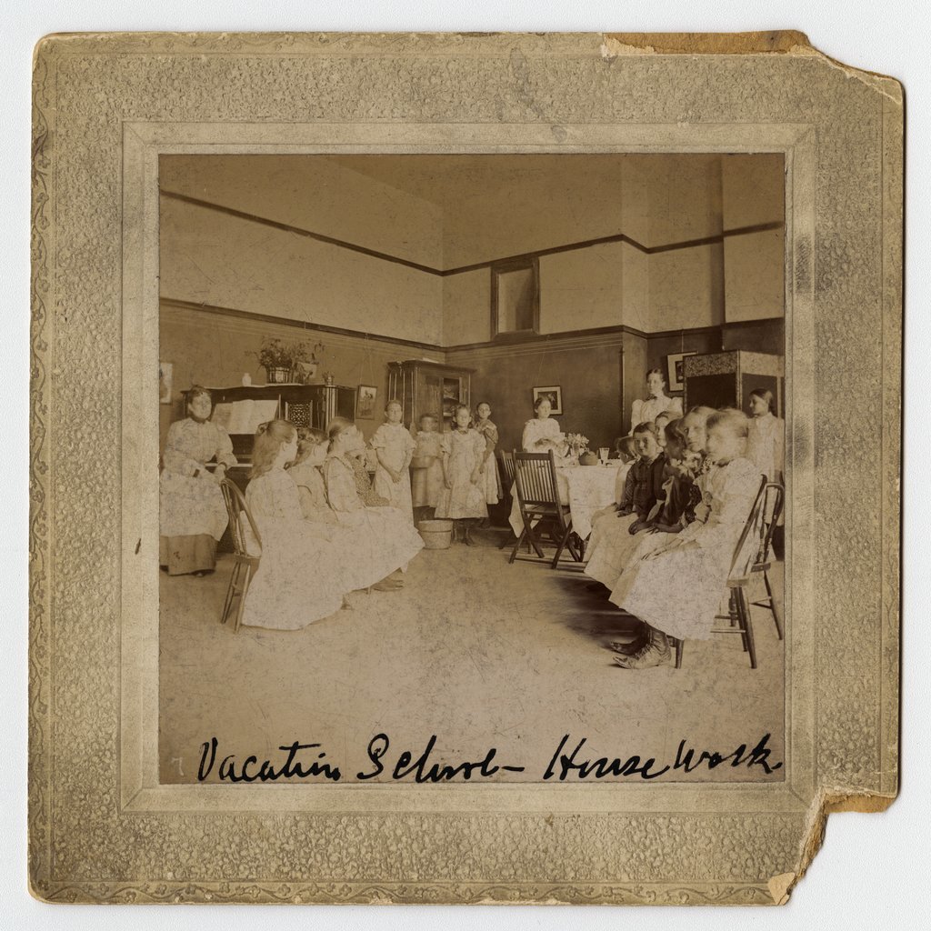 Girls in a classroom at Mary McDowell Settlement House
