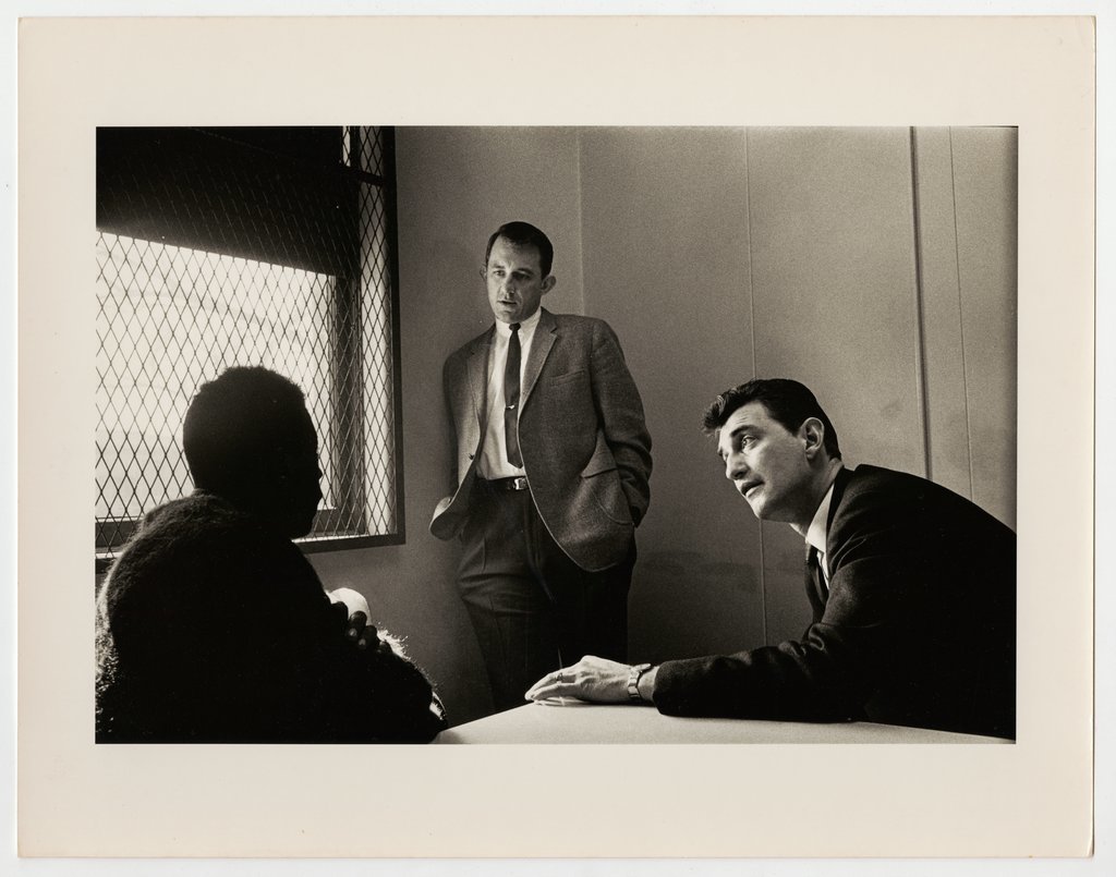 Detectives Peter Valesares (right) and John Sullivan (center) question a suspect - Haun, Declan