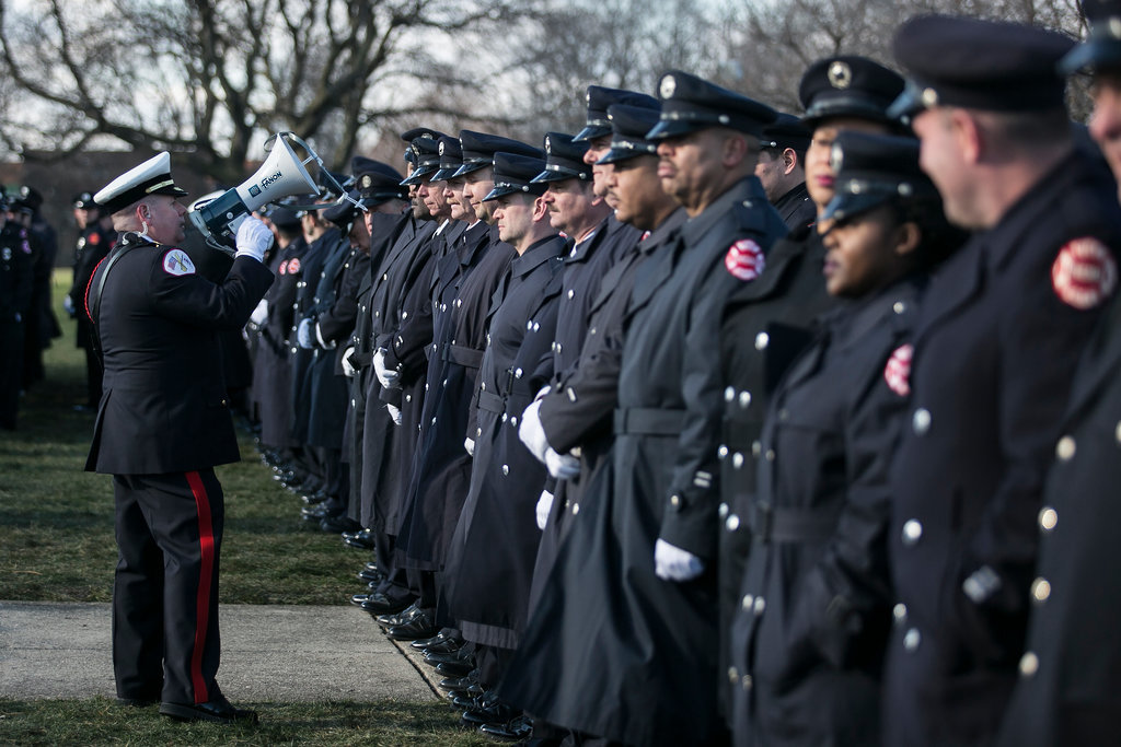 Chicago Fire Department personnel after funeral services for firefighter Daniel Capuano - Ashlee Rezin for the Chicago Sun-Times