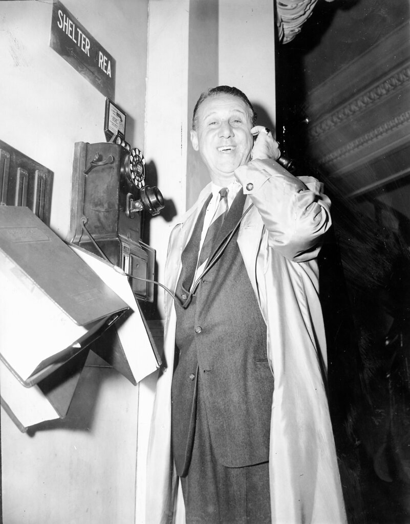Lawyer Sidney Korshak make a call while waiting to be called by a grand jury - Ralph Waters for Chicago Sun-Times