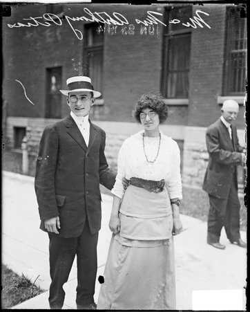 Theresa Hollander murder case, Mr. and Mrs. Anthony Petras standing on a sidewalk - Chicago Daily News, Inc.