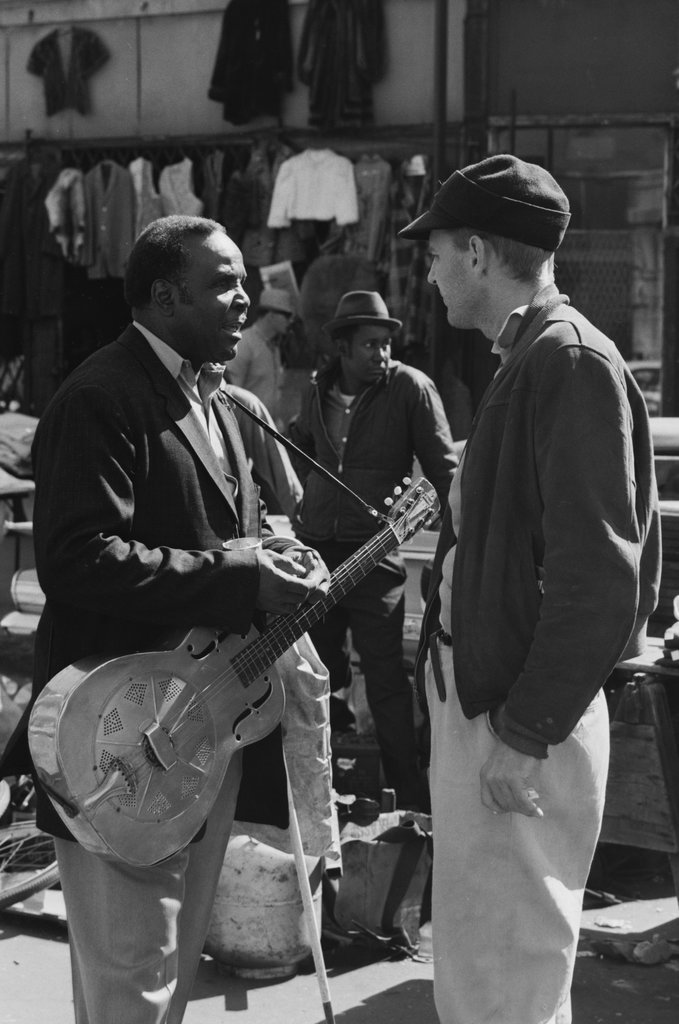 Musician at Maxwell Street Market - Haun, Declan, 1937-1994