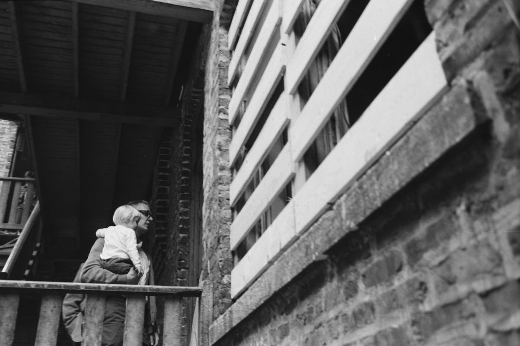 People entering a building from the rear stairs - Haun, Declan, 1937-1994