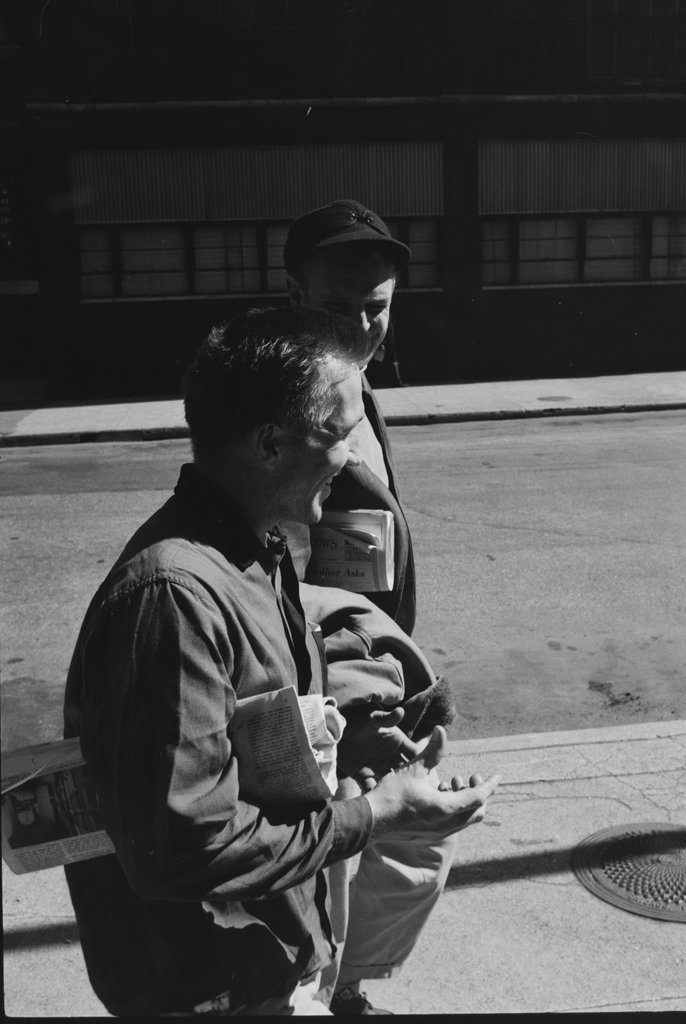Two people walking on an unidentified street - Haun, Declan, 1937-1994