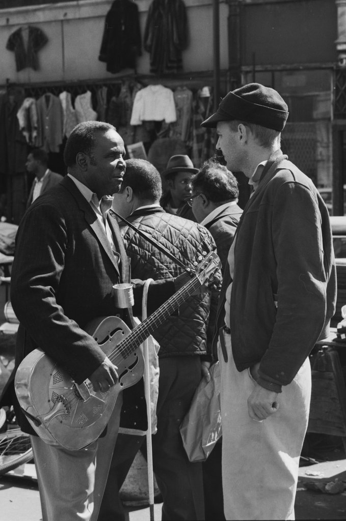 Musician at Maxwell Street Market - Haun, Declan, 1937-1994