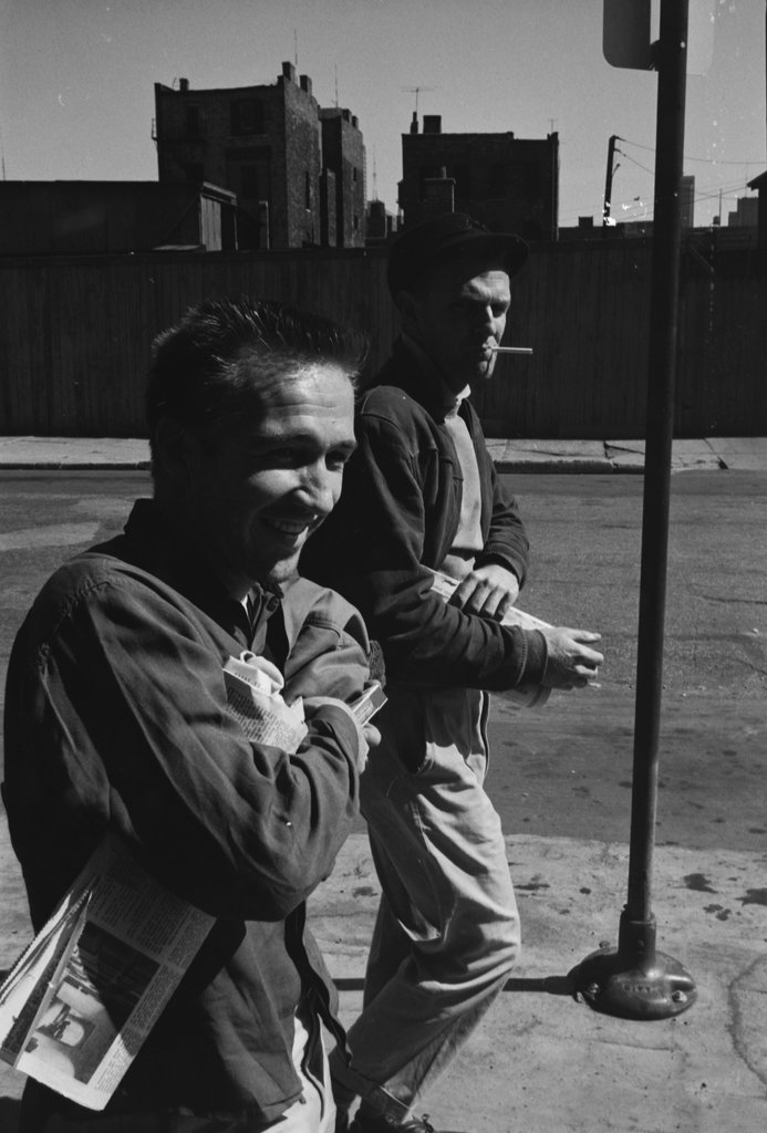 Two people walking on an unidentified street - Haun, Declan, 1937-1994