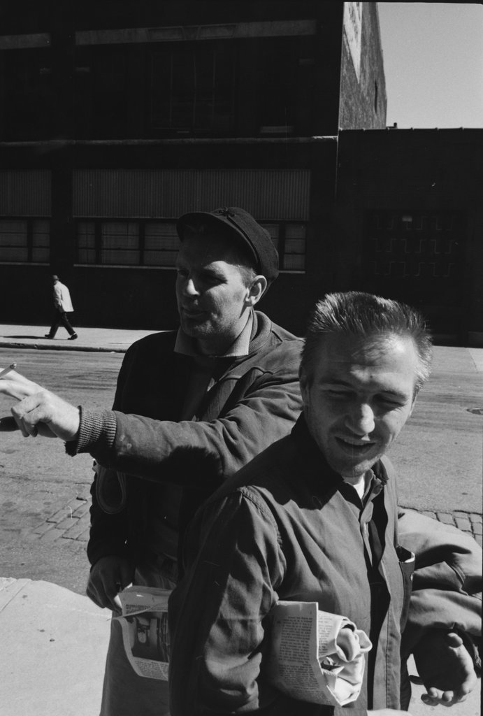 Two people walking on an unidentified street - Haun, Declan, 1937-1994
