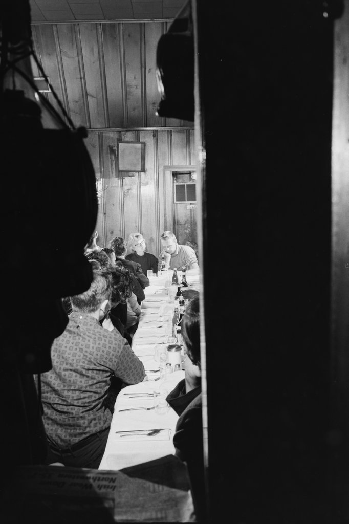 Group of people in a meeting at a bar or restaurant - Haun, Declan, 1937-1994