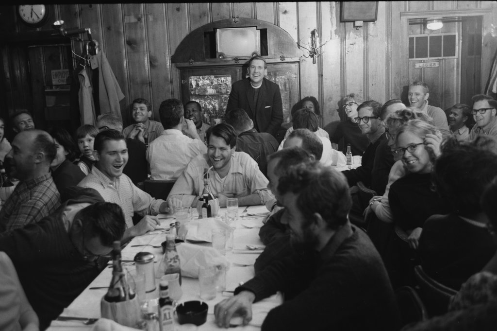 Group of people in a meeting at a bar or restaurant - Haun, Declan, 1937-1994