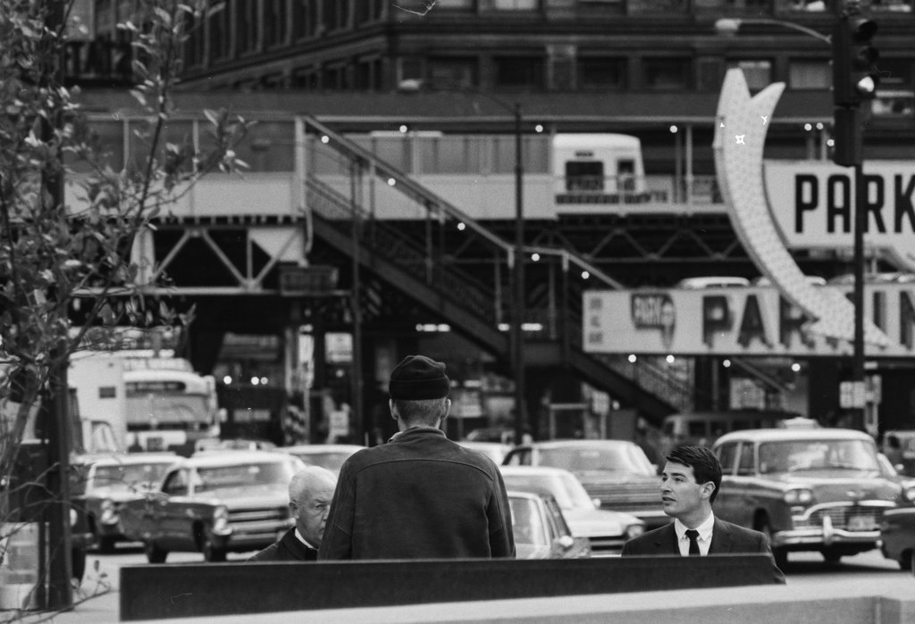 Street scene near an elevated train station in the Loop - Haun, Declan, 1937-1994