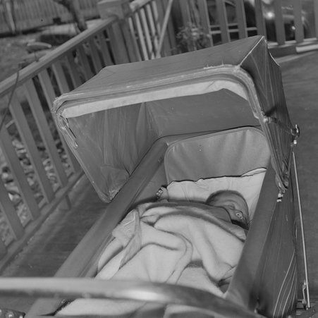 Baby sleeping in a baby carriage next door to 6819 South Yale Avenue - Mead, Mildred