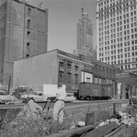 Artist working on West Kinzie Street in River North - Mead, Mildred