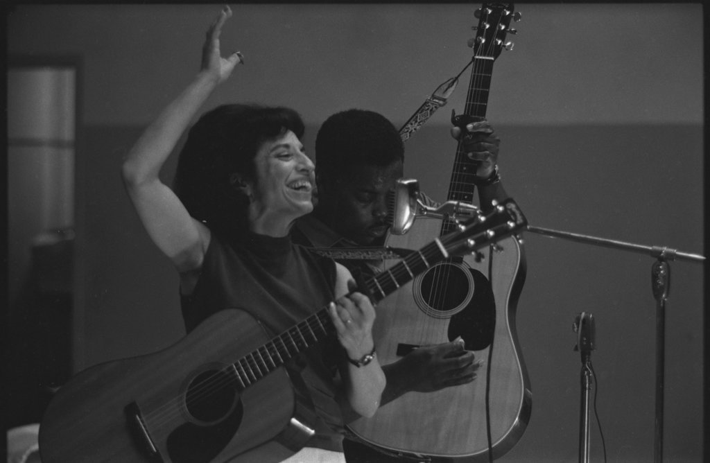 George and Norma during a performance in a school  auditorium - Flerlage, Raeburn, 1915-2002