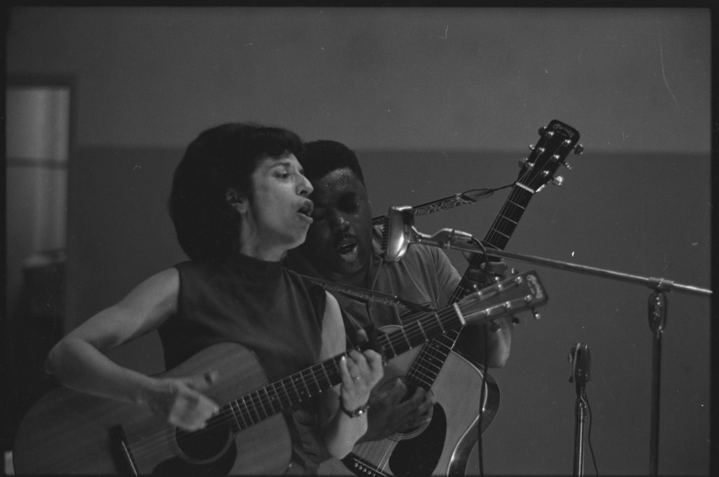 George and Norma during a performance in a school  auditorium - Flerlage, Raeburn, 1915-2002
