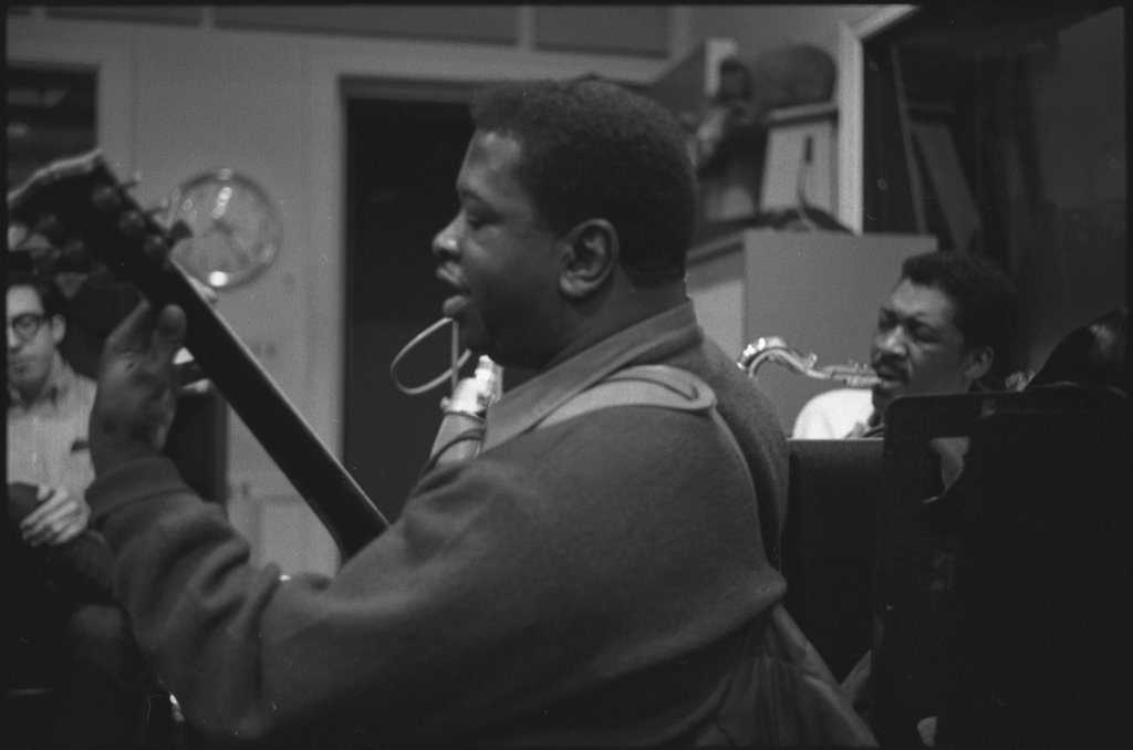 Jimmy Dawkins, Lafayette Leake, Mighty Joe Young, and Eddie Shaw in a recording studio for a Delmark Records recording session - Flerlage, Raeburn, 1915-2002