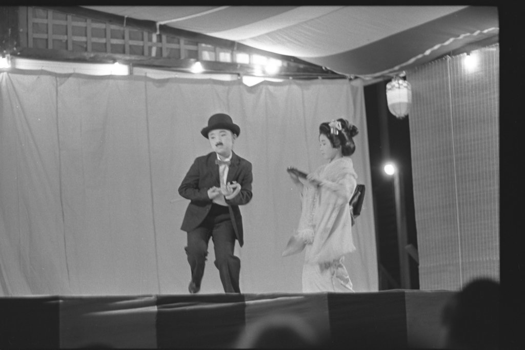 Performance of people wearing traditional Japanese costume - Flerlage, Raeburn, 1915-2002