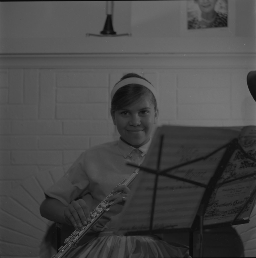 Raeburn Flerlage and a girl playing the flute and recorder - Flerlage, Raeburn, 1915-2002