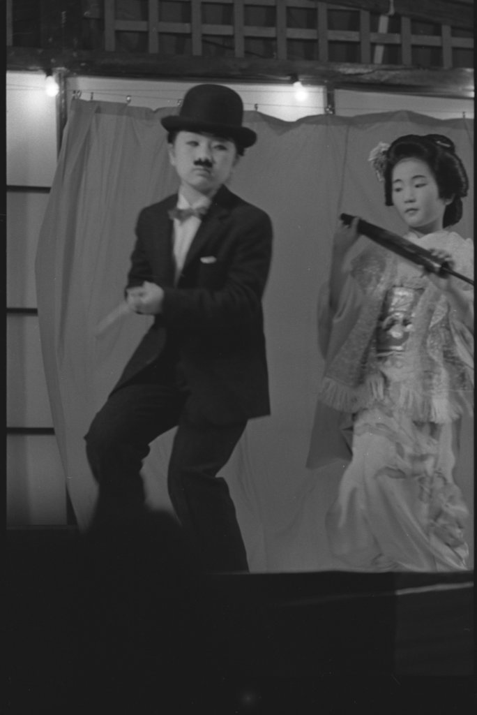 Performance of people wearing traditional Japanese costume - Flerlage, Raeburn, 1915-2002