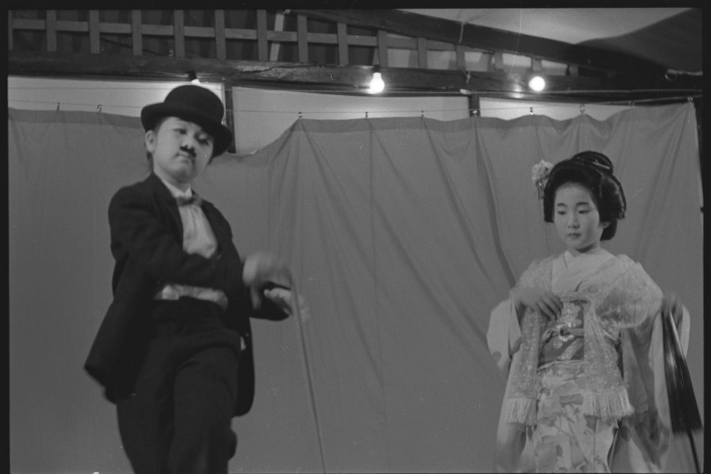 Performance of people wearing traditional Japanese costume - Flerlage, Raeburn, 1915-2002